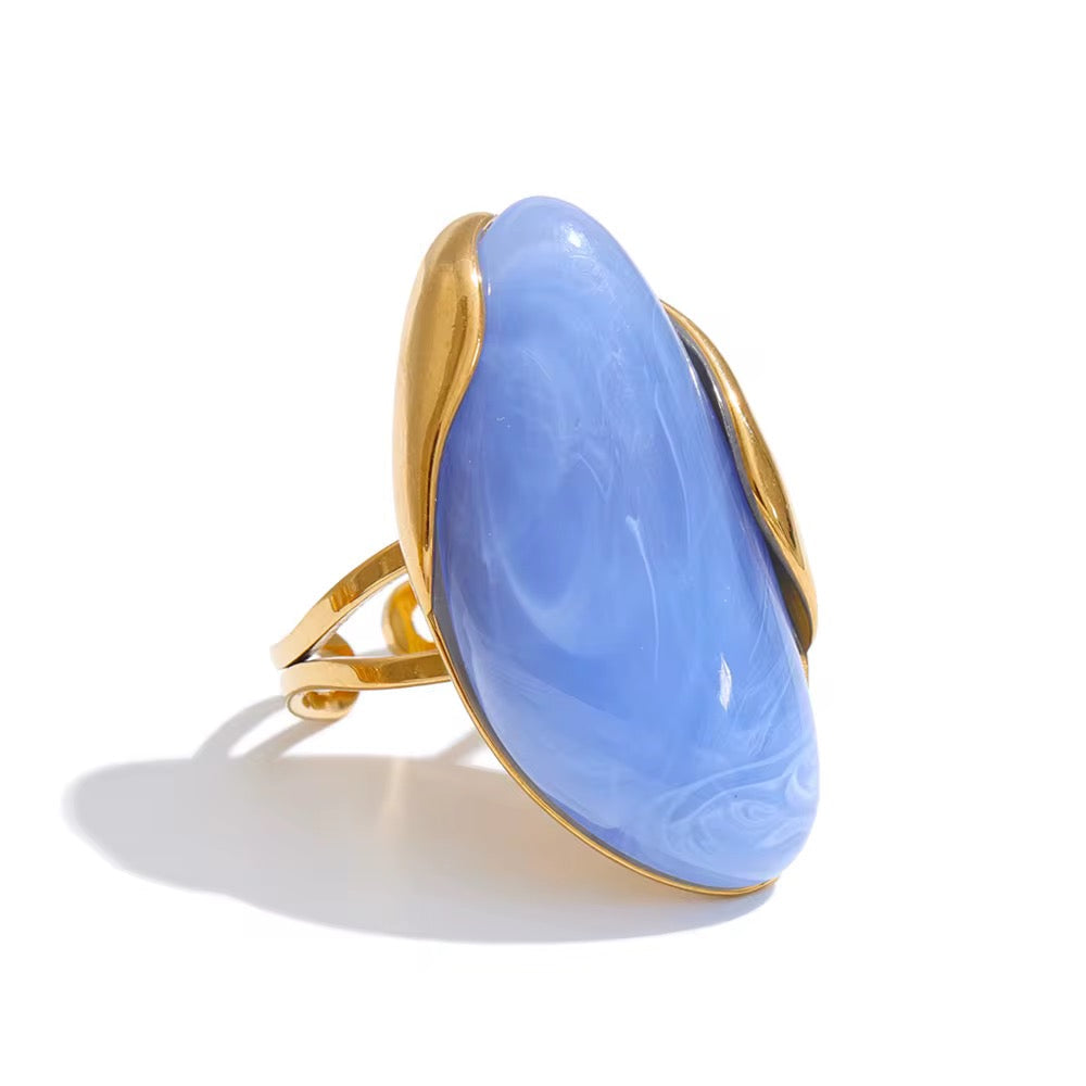 Anel Feminino Dourado com Pedra Laranja de Design Moderno