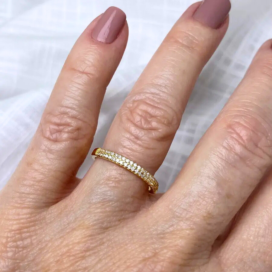 Gold-plated ring studded with cubic zirconia.