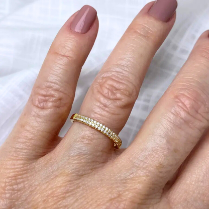 Gold-plated ring studded with cubic zirconia.