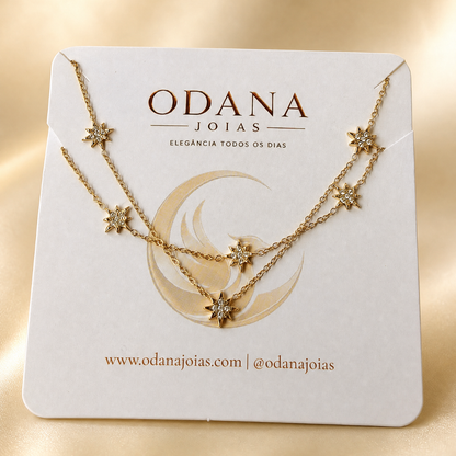 Conjunto Dourado em Aço tranquilo com Pendentes de Estrelas