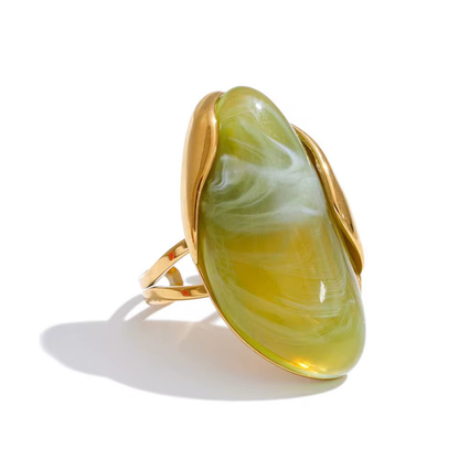Anel Feminino Dourado com Pedra Laranja de Design Moderno
