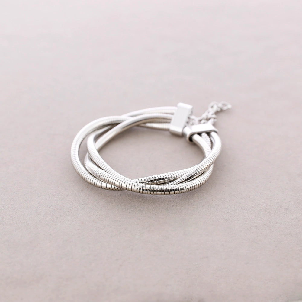 Pulseira de metal de arame triplo