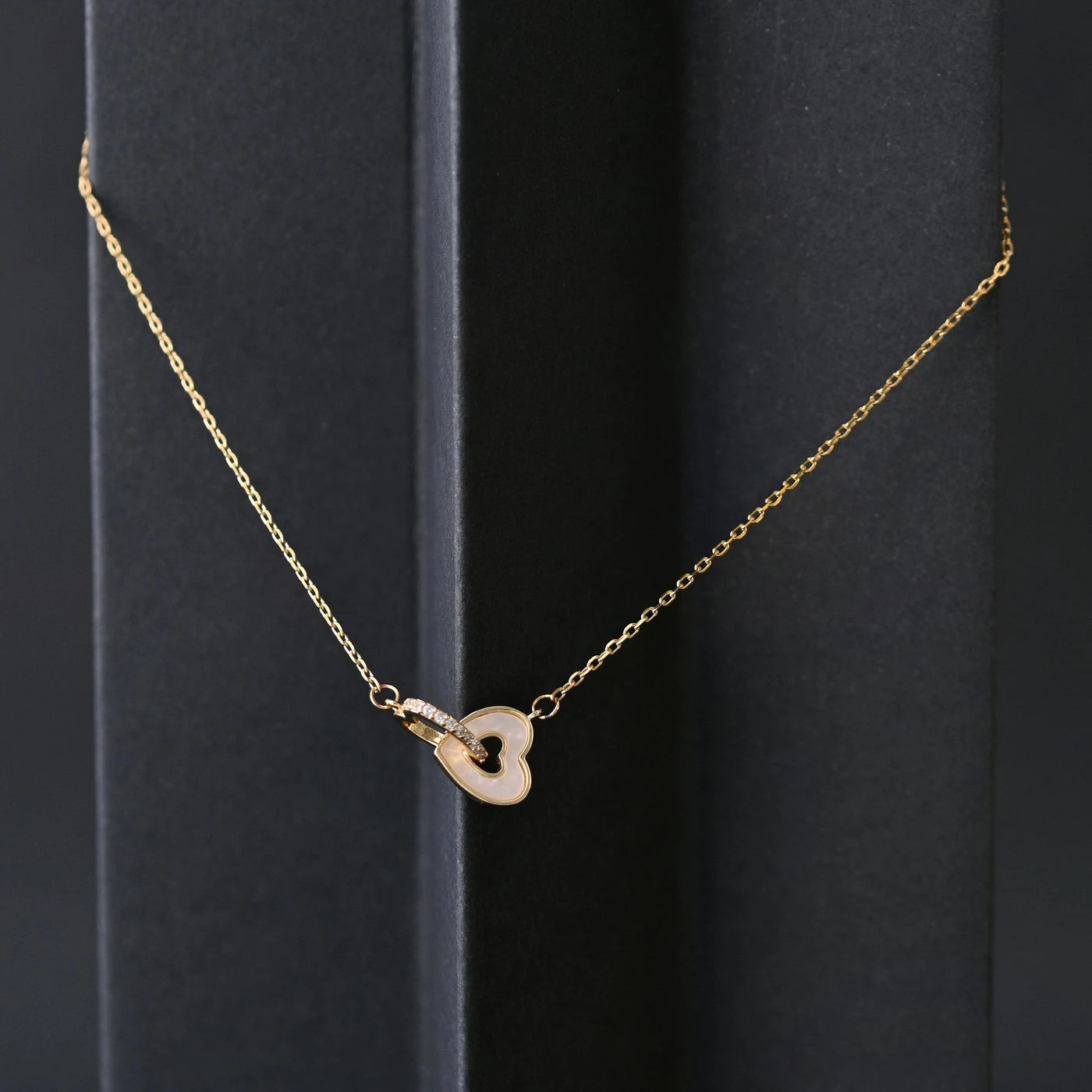 Intertwined Heart Necklace with Zirconias