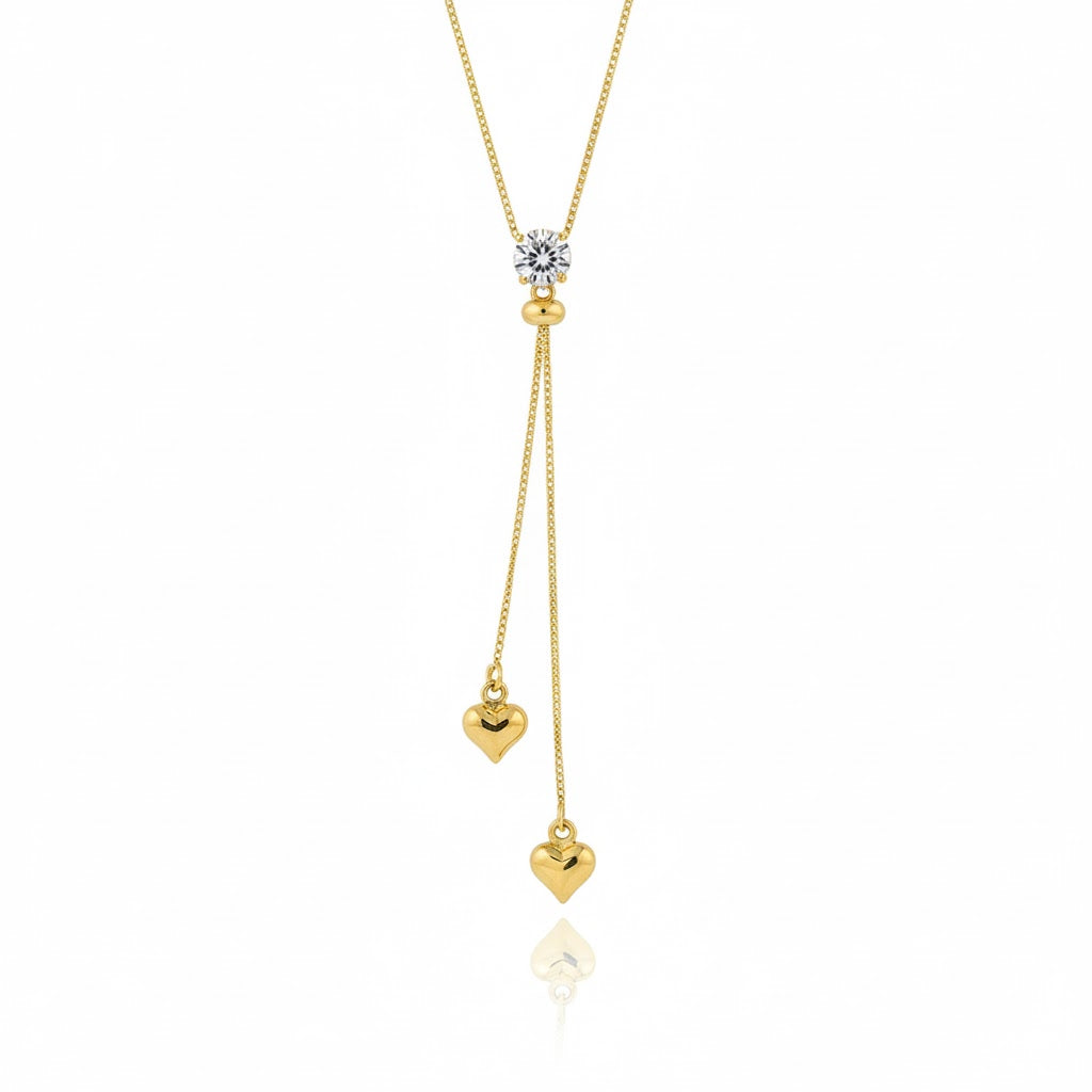 Gold Tie Necklace with Hearts and a Sparkling Stone
